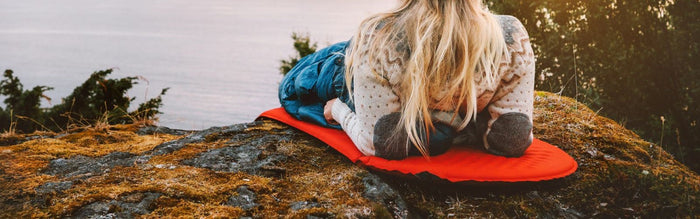 a women on a sleeping pad