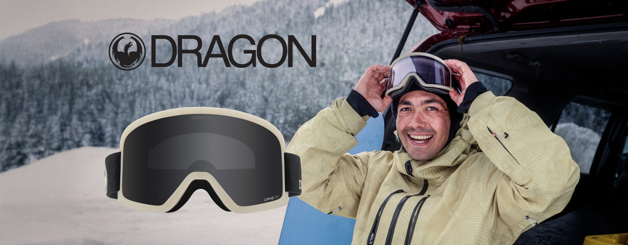 tyler sitting in tailgate in dragon goggles with snowy scene behind him. text says dragon then a photo of the goggles