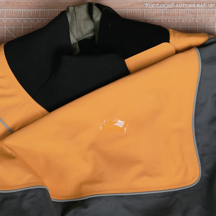 Gear Aid Aquaseal FD smoothed onto a drysuit repair