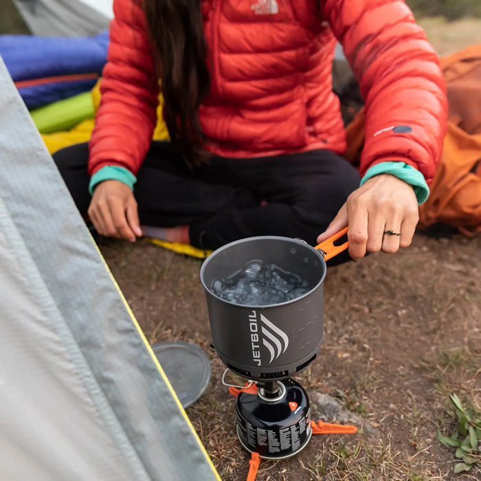 Jetboil Stash boiling water at camp