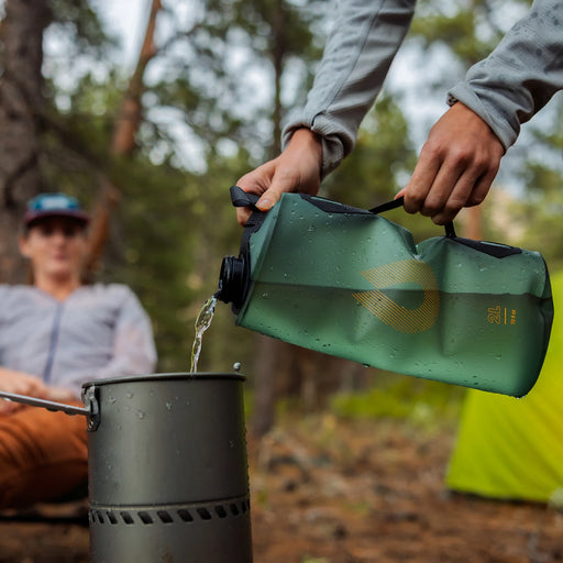 Hydrapak Seeker water bag in use at camp