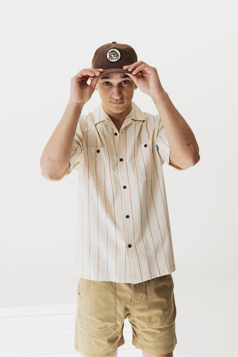 KAVU Island Bound shirt in Sand Stripe, on model