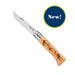 Opinel No.08 folding knife with engraved alpine handle