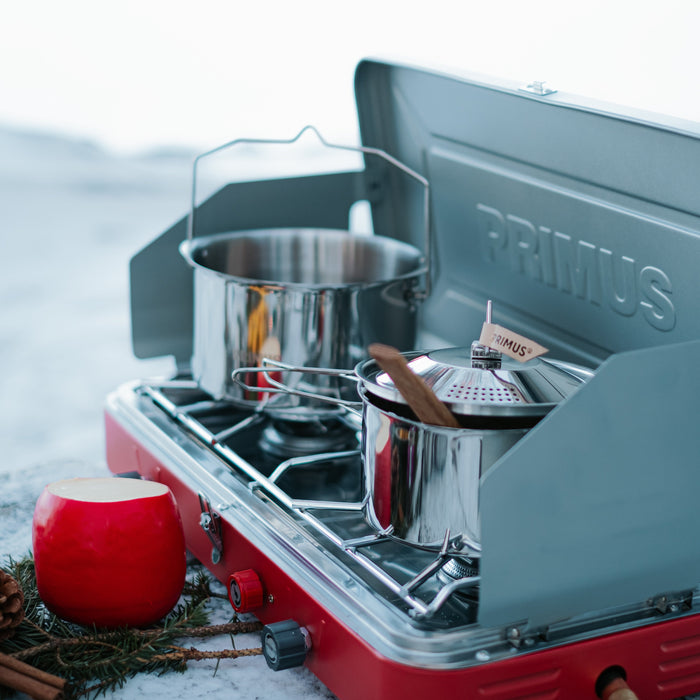 Primus Profile stove in use cooking at camp