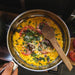 Primus CampFire Frying Pan 25 cm cooking over a fire